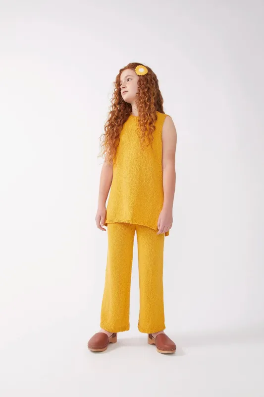 Top largo de niña punto amarillo sold by Compania Fantasica