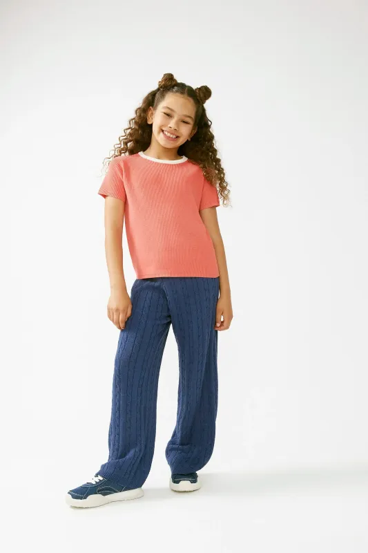 Top de niƱa punto manga corta rosa sold by Compania Fantasica