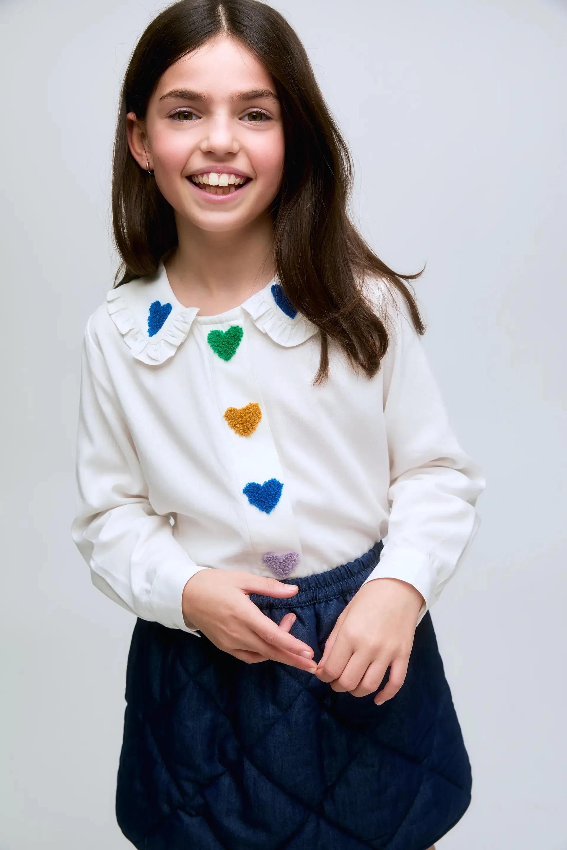 Falda corta de niña en denim acolchado con cintura elástica. sold by Compania Fantasica product image thumbnail 4