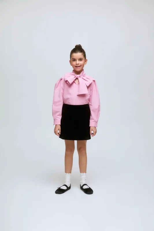 Falda corta de niña de pana en color negro canalé. sold by Compania Fantasica