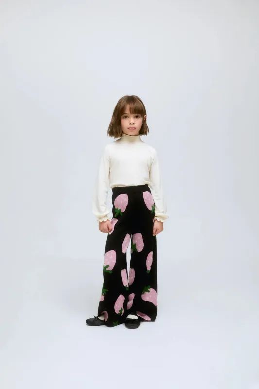 Jersey de niña blanco de cuello alto y puños fruncidos sold by Compania Fantasica