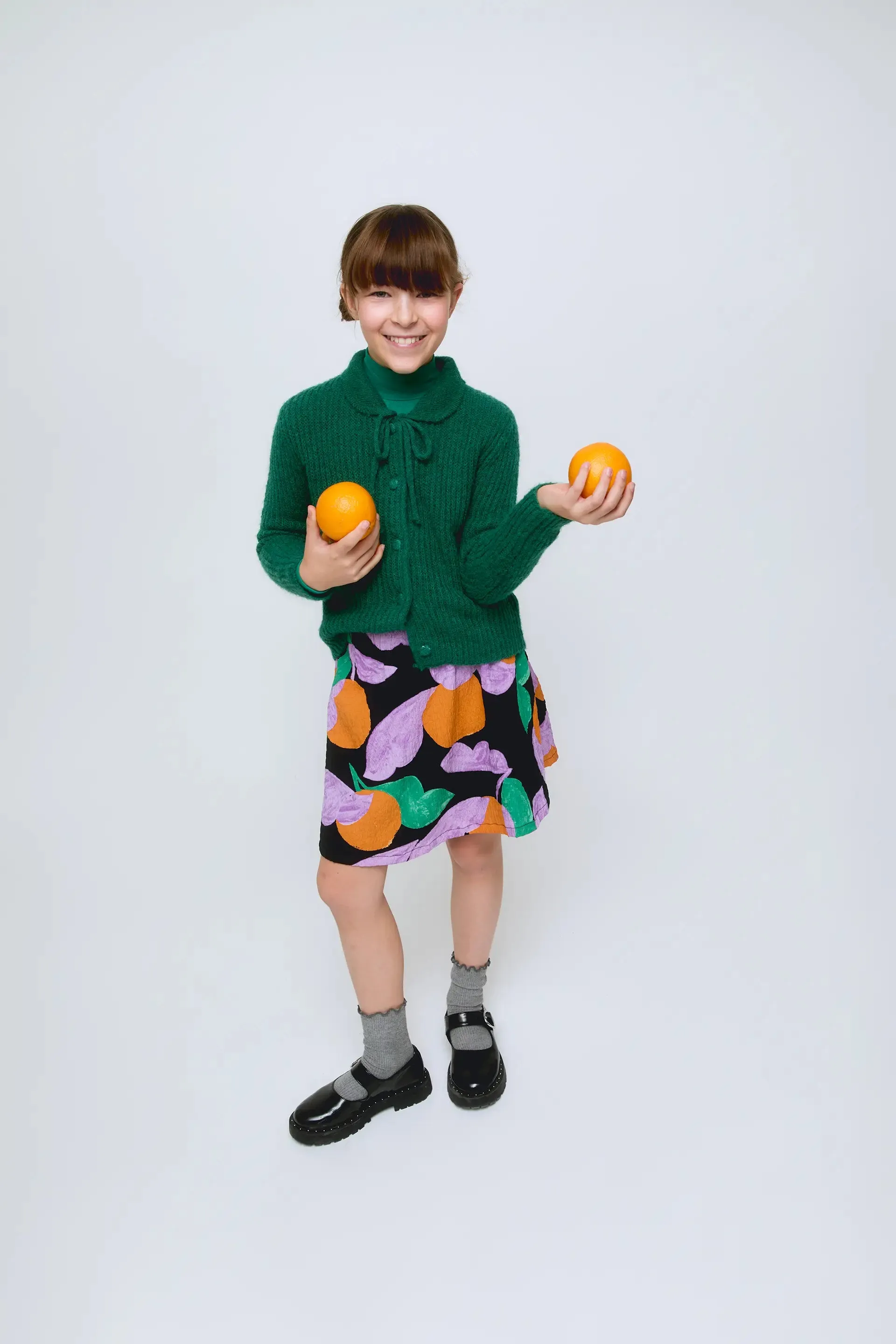 Falda corta de niña con estampado de frutas Apricot sold by Compania Fantasica product image thumbnail 4