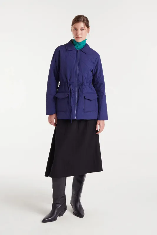 Abrigo corto azul sold by Compania Fantasica