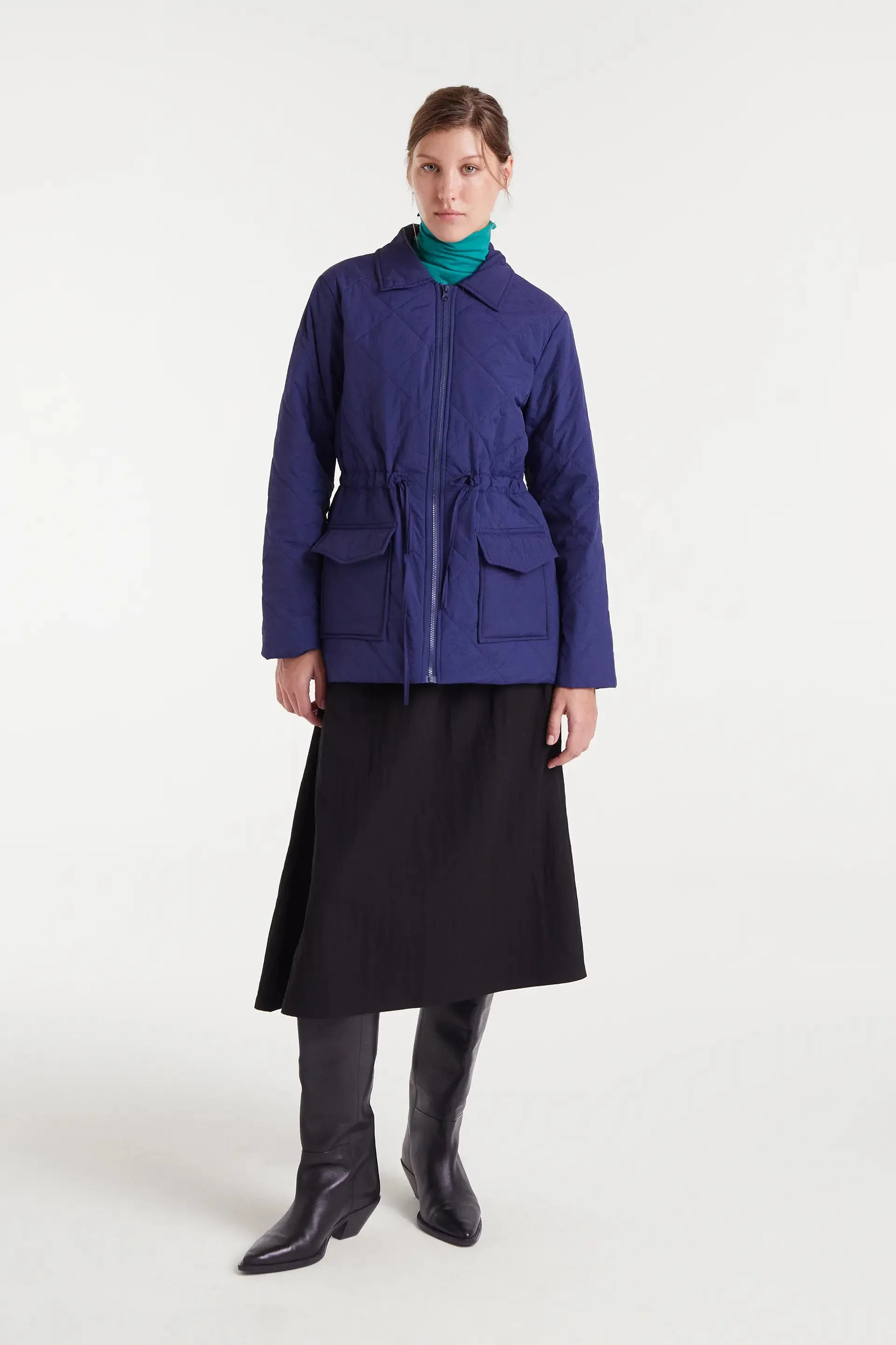 Abrigo corto azul sold by Compania Fantasica