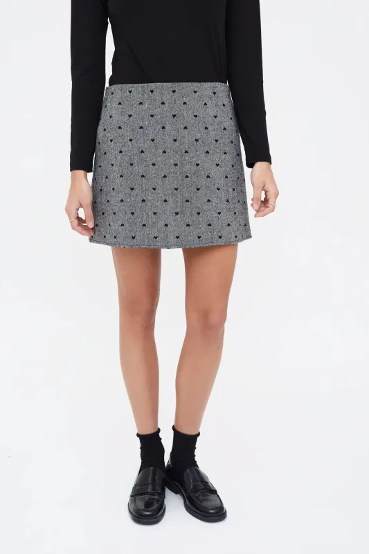 Falda tweed con estampado de corazones negro sold by Compania Fantasica