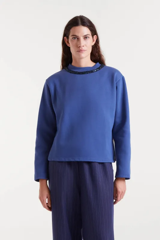 Sudadera cuello redondo con lentejuelas sold by Compania Fantasica