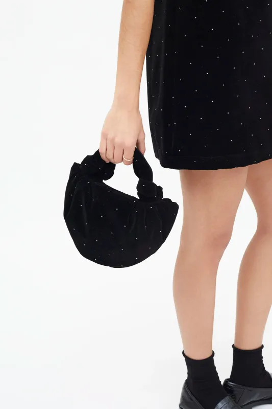 Bolso de mano terciopelo negro sold by Compania Fantasica