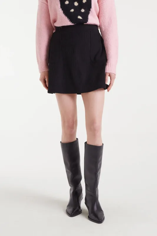 Falda corta de pana negro sold by Compania Fantasica