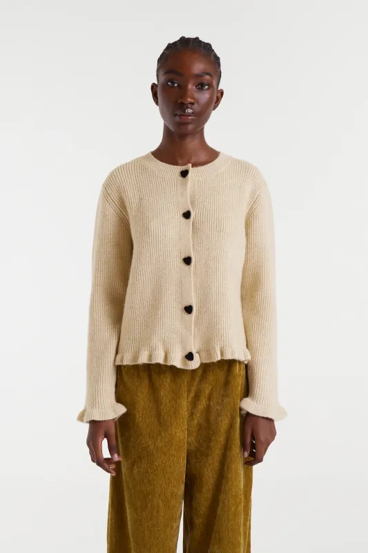 Cárdigan punto beige con detalle de corazones sold by Compania Fantasica
