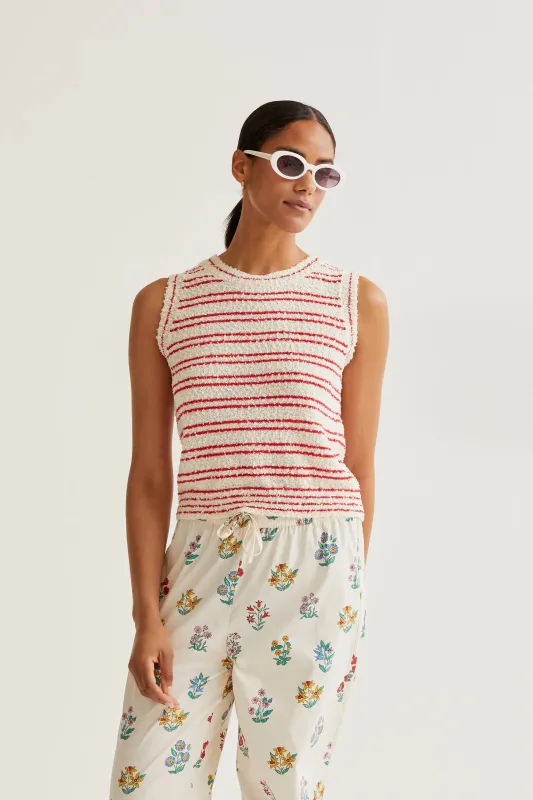 Top punto texturizado con rayas rojas sold by Compania Fantasica