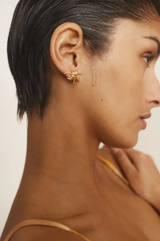 REVERIE STATEMENT SHELL STUDS sold by Alemais