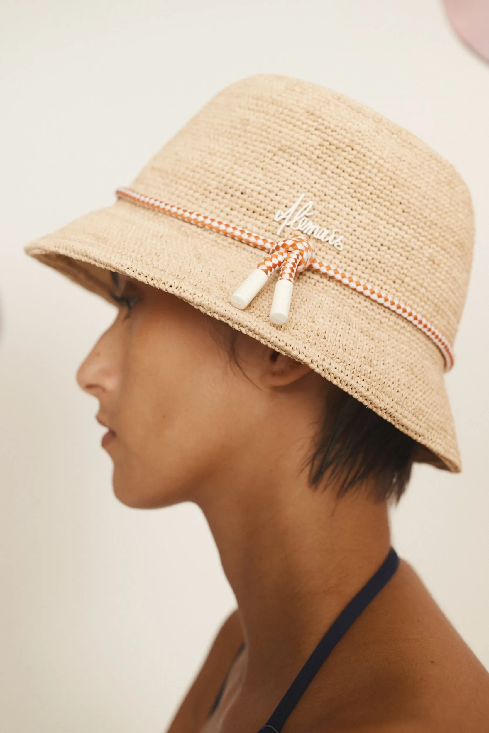 SUNLIT RAFFIA BUCKET HAT sold by Alemais