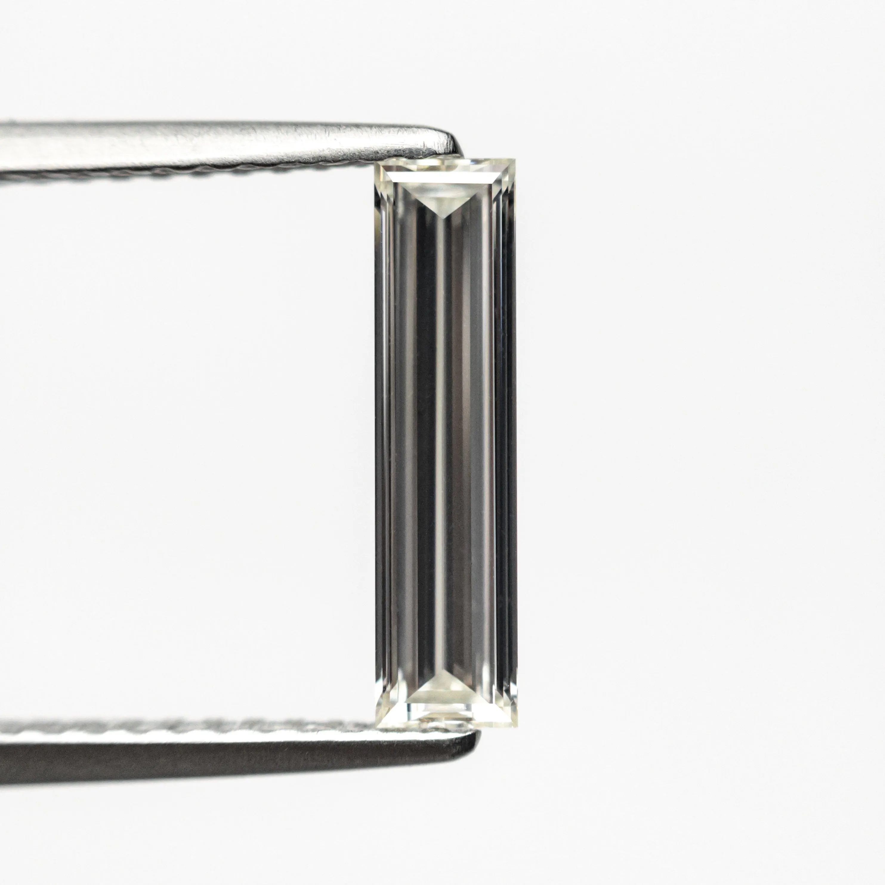 0.70ct 11.58x2.89x1.80mm GIA Internally Flawless H Baguette Step Cut 24300-01 sold by Young In The Mountains product image thumbnail 2