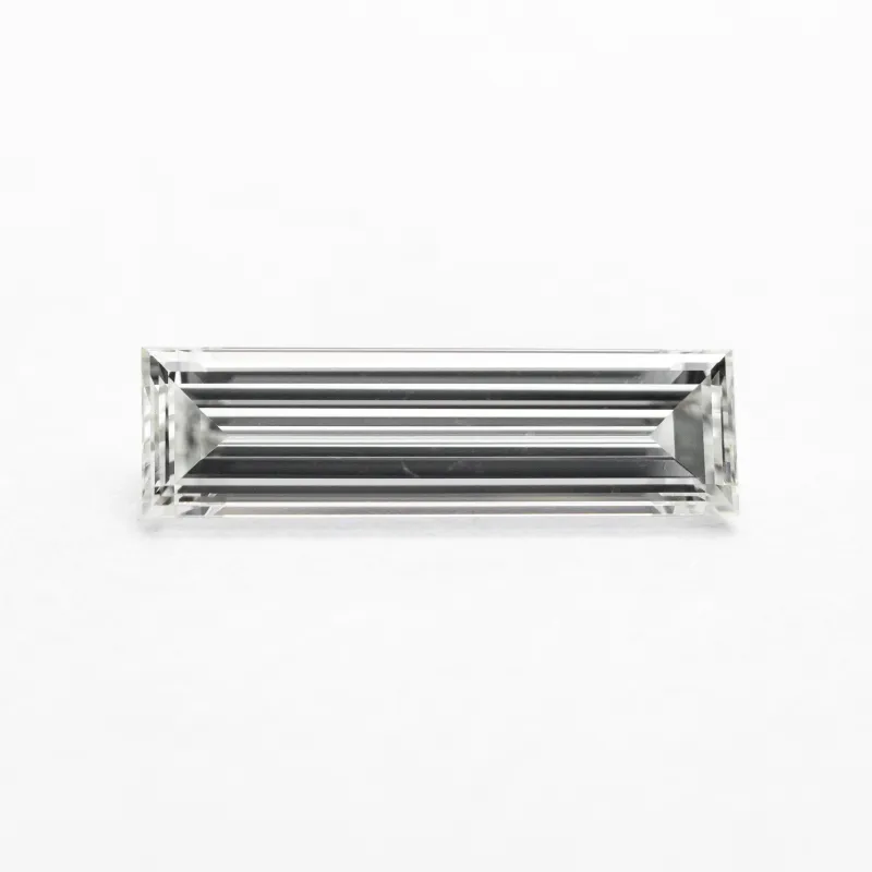 0.78ct 11.17x3.24x2.06mm GIA VS2 H Baguette Step Cut 24303-01 sold by Young In The Mountains