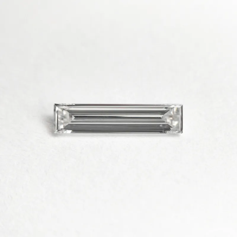 0.25ct 9.05x2.06x1.24mm VS1 E Baguette Step Cut 24701-07 sold by Young In The Mountains