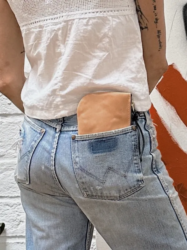 Lauri Large Leather Wallet: Saddle sold by Eleven Thirty