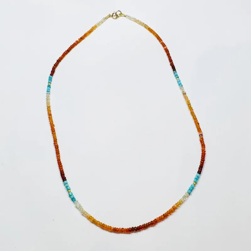 delicate smooth fire opal necklace with turquoise and gold nuggets sold by Theodosia