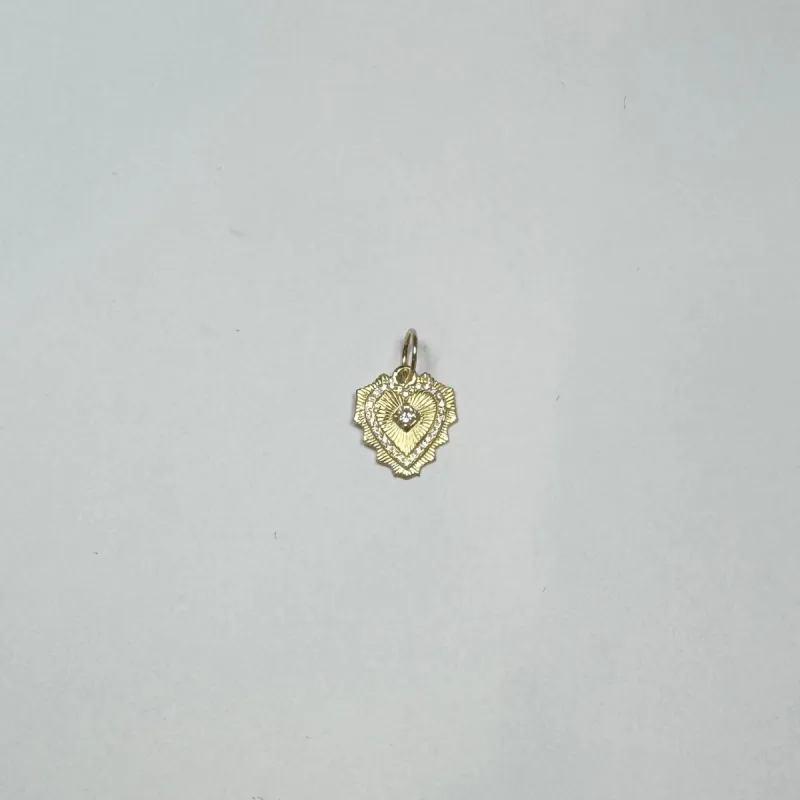 mini doily heart pendant sold by Theodosia