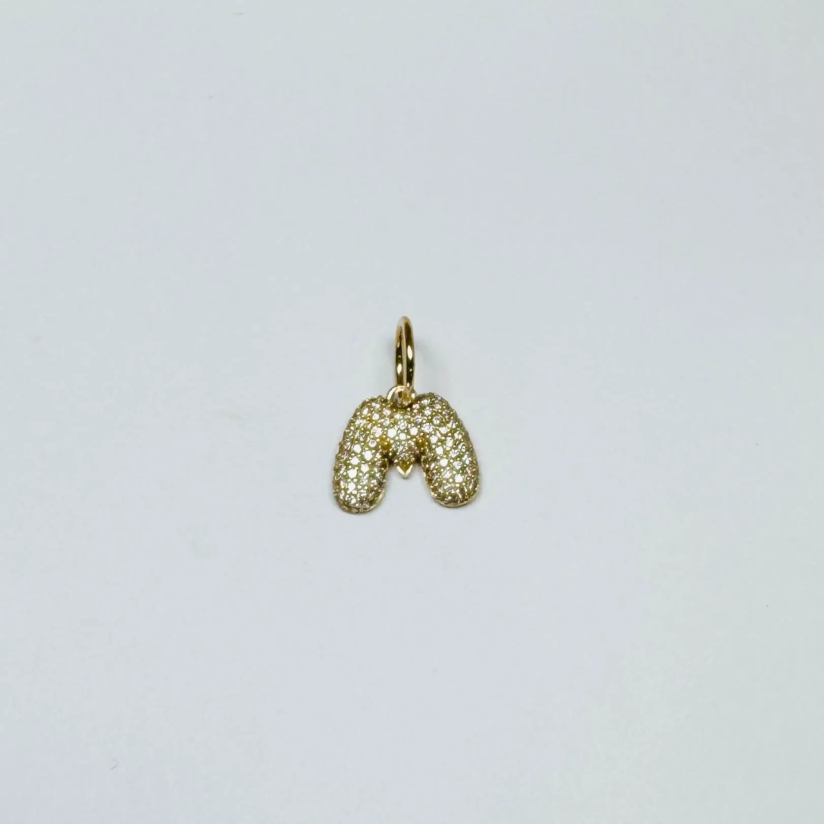 pave diamond letter pendant sold by Theodosia