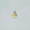 small fluted heart pendant sold by Theodosia