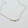 gold bar center diamond necklace sold by Theodosia