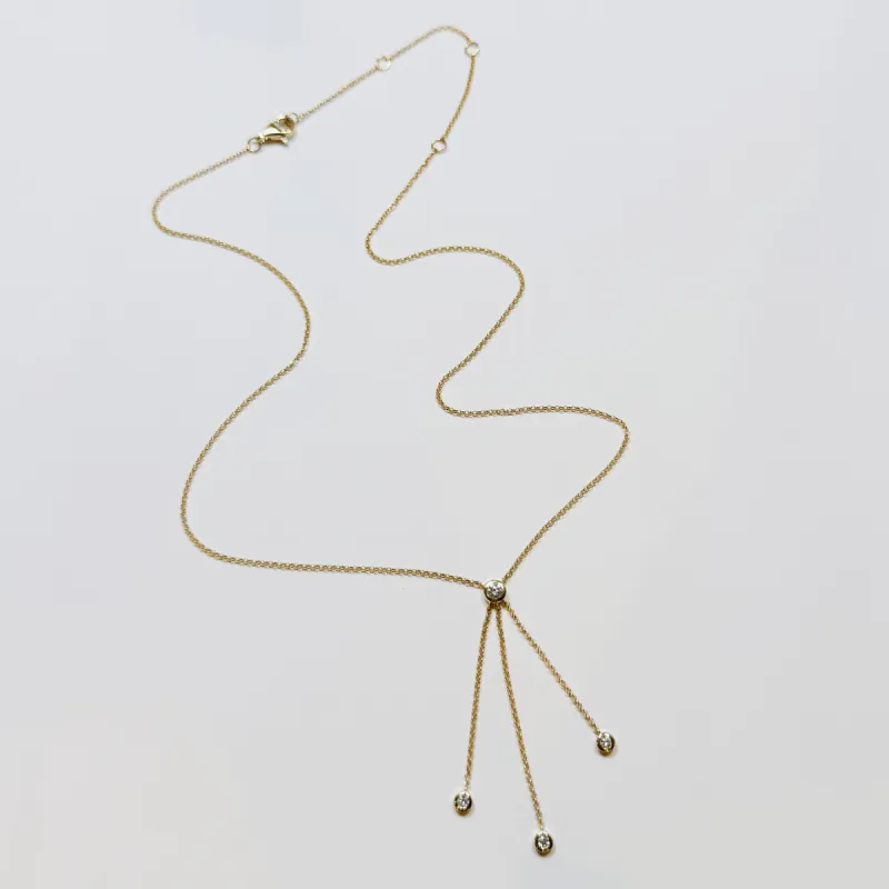 tri-diamond tassel necklace sold by Theodosia