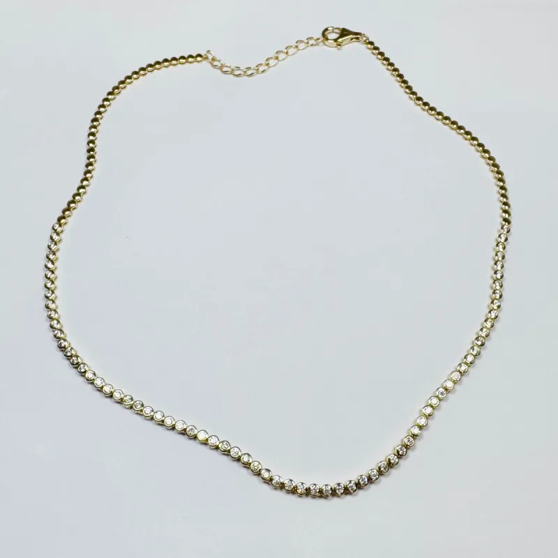 bezel set diamond tennis necklace sold by Theodosia
