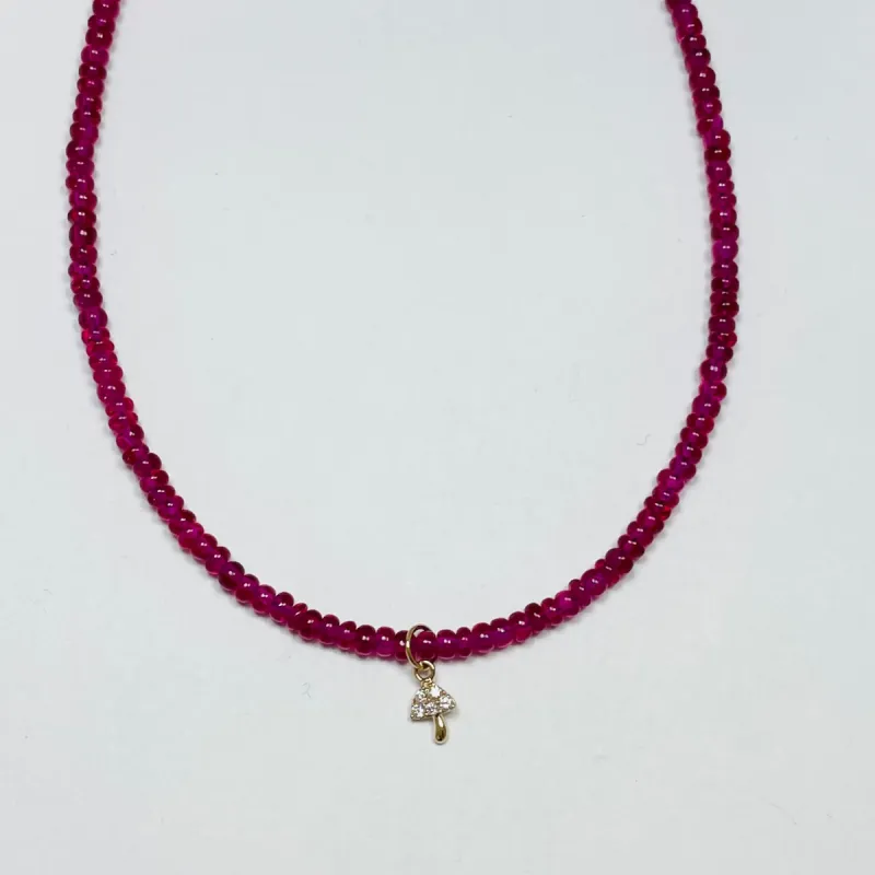 delicate aquamarine necklace with starburst charm sold by Theodosia