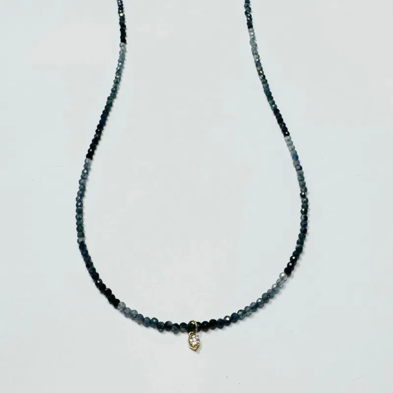 delicate necklace with prong set diamond sold by Theodosia