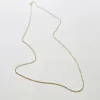14 k gold faceted ball chain, 1 mm sold by Theodosia
