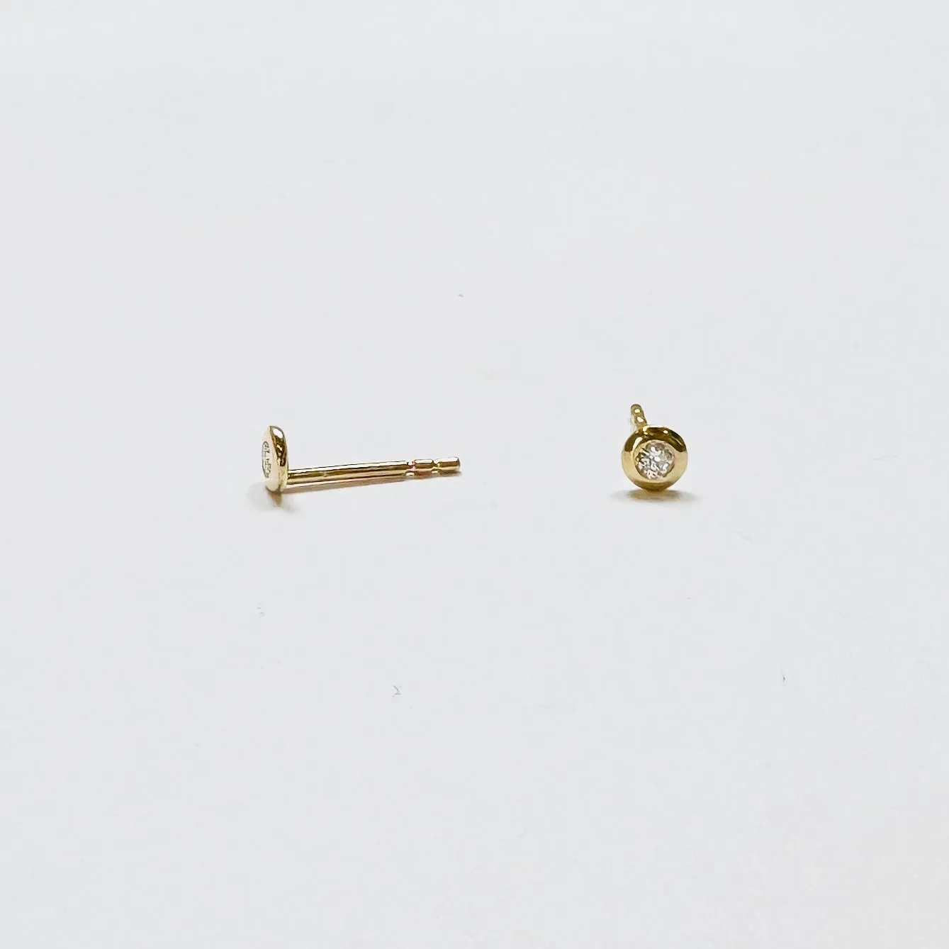 flat bezel diamond studs sold by Theodosia product image thumbnail 2