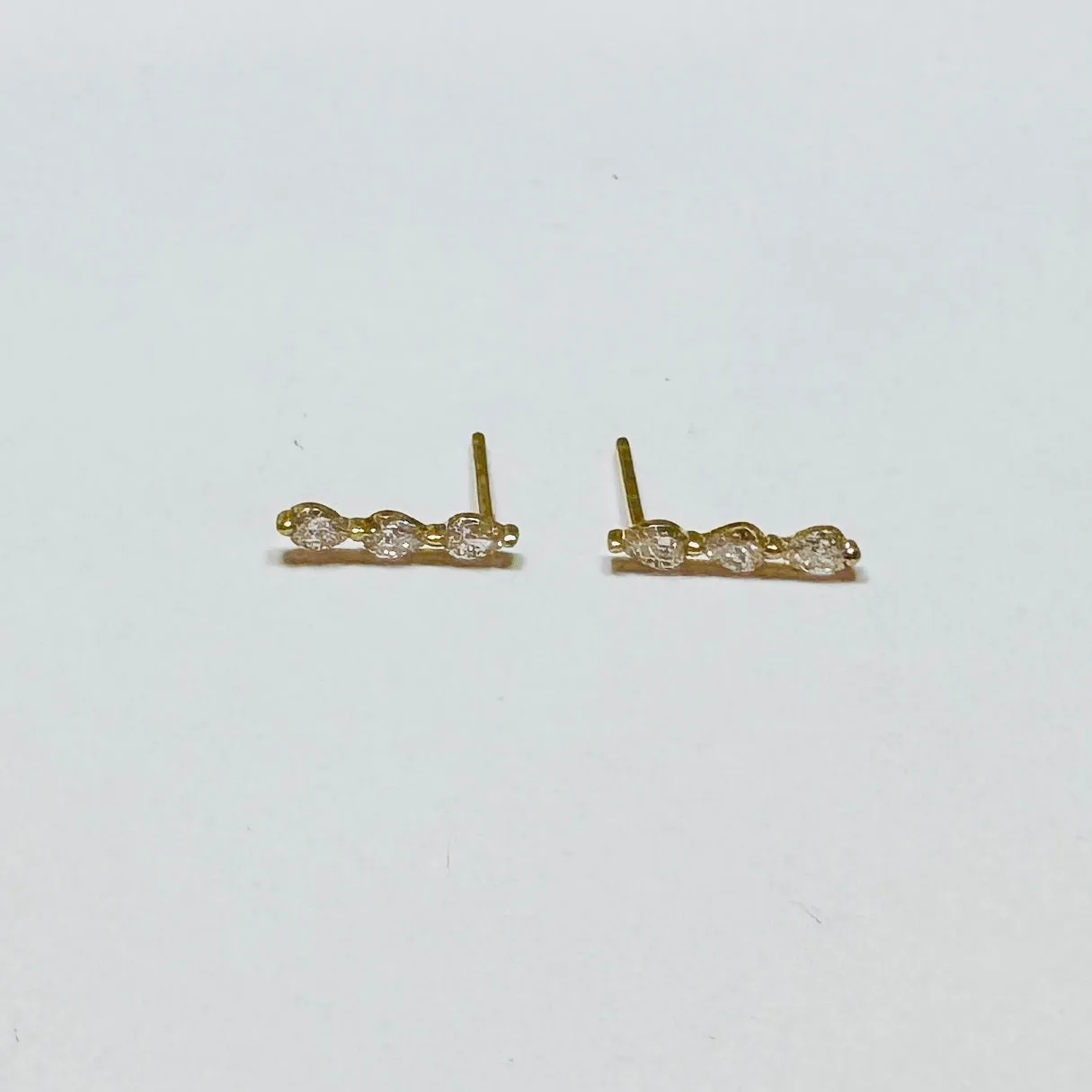 marquee diamond bar studs sold by Theodosia