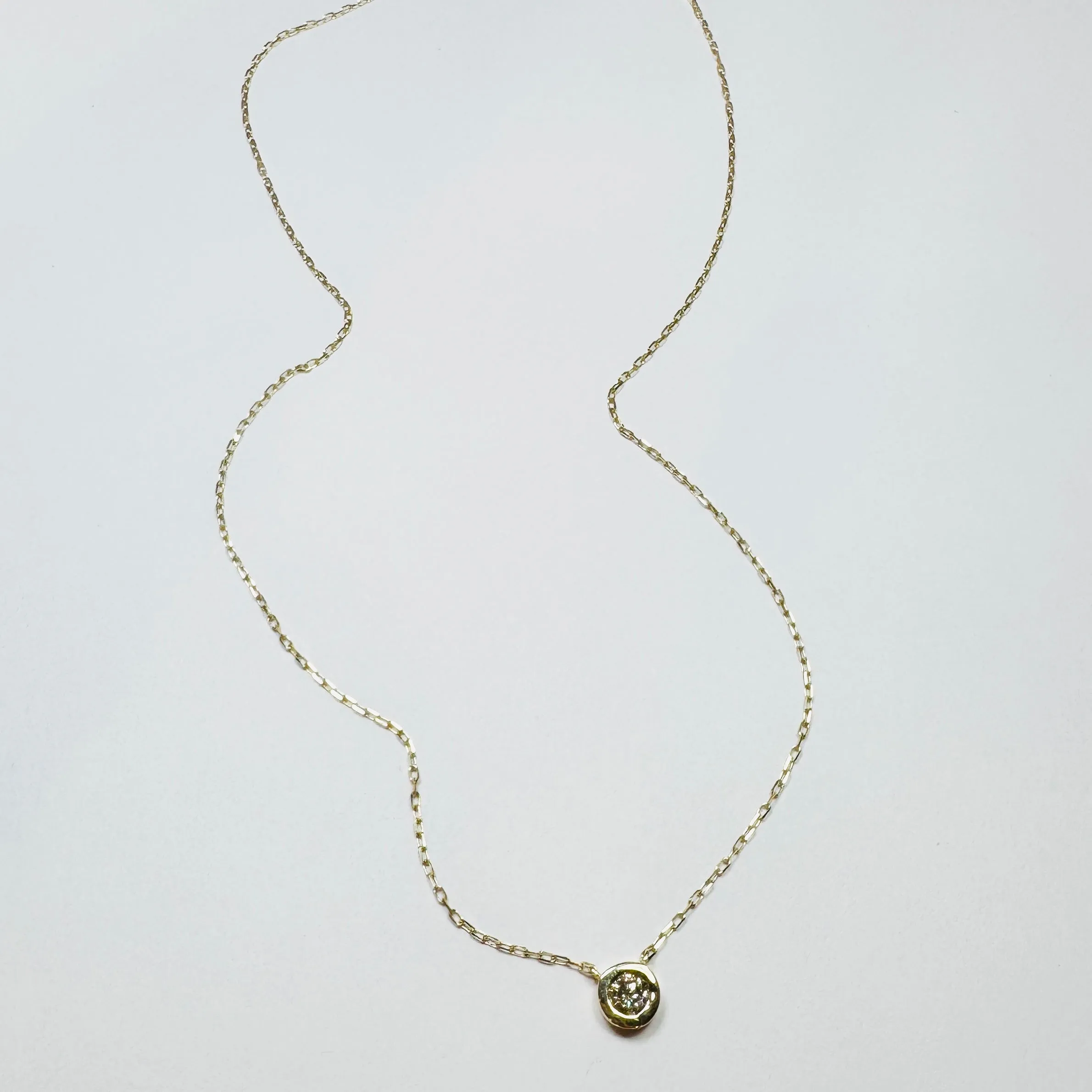 14 kt gold bezel set diamond chain sold by Theodosia