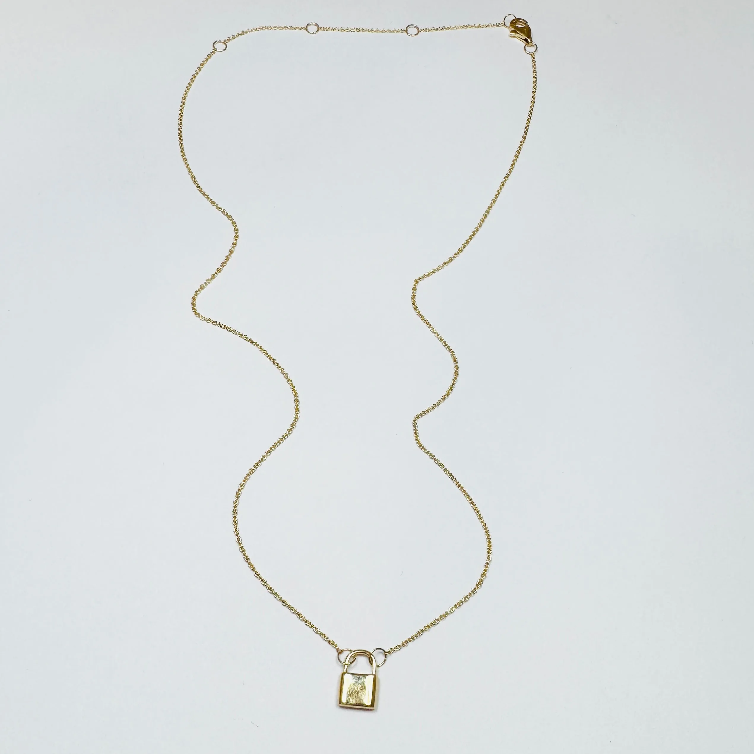 lock necklace sold by Theodosia