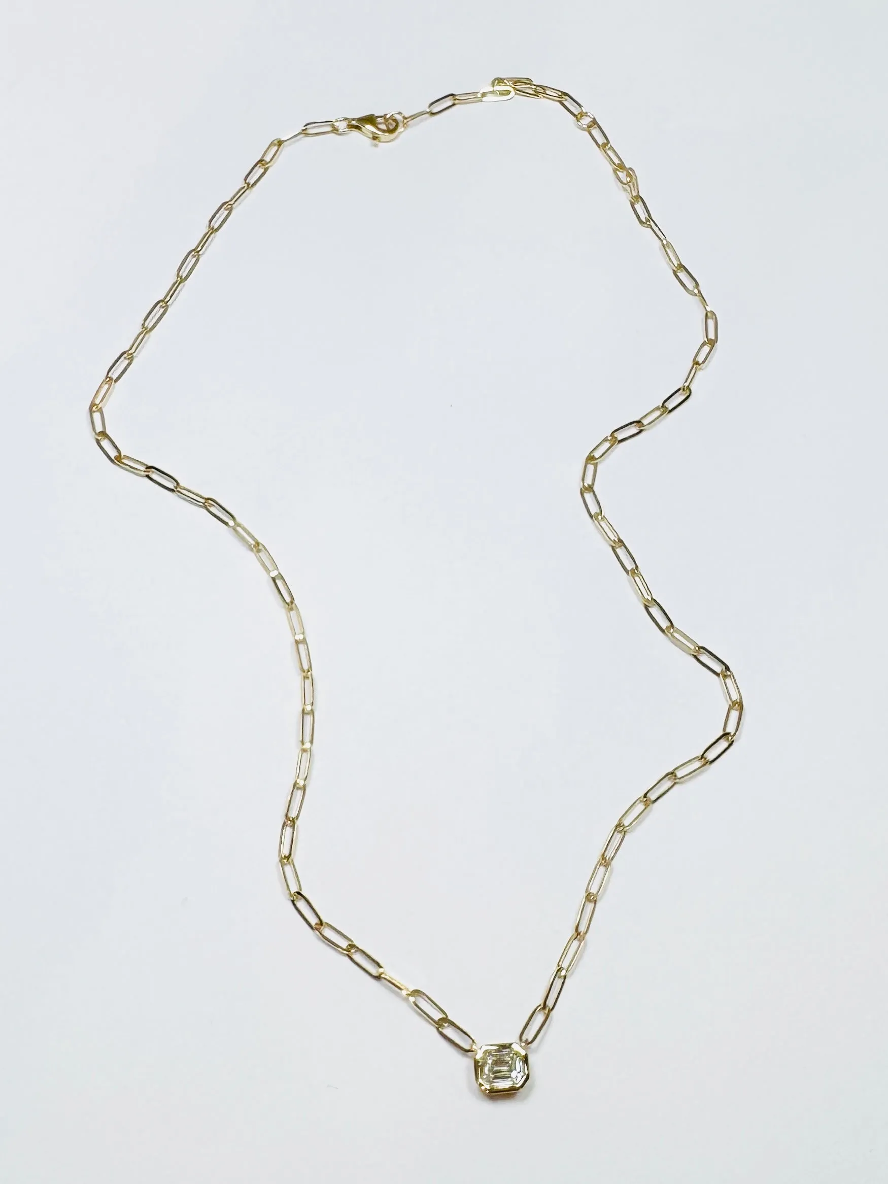 14 kt gold illusion set diamond on paperclip chain, 1.25 sold by Theodosia