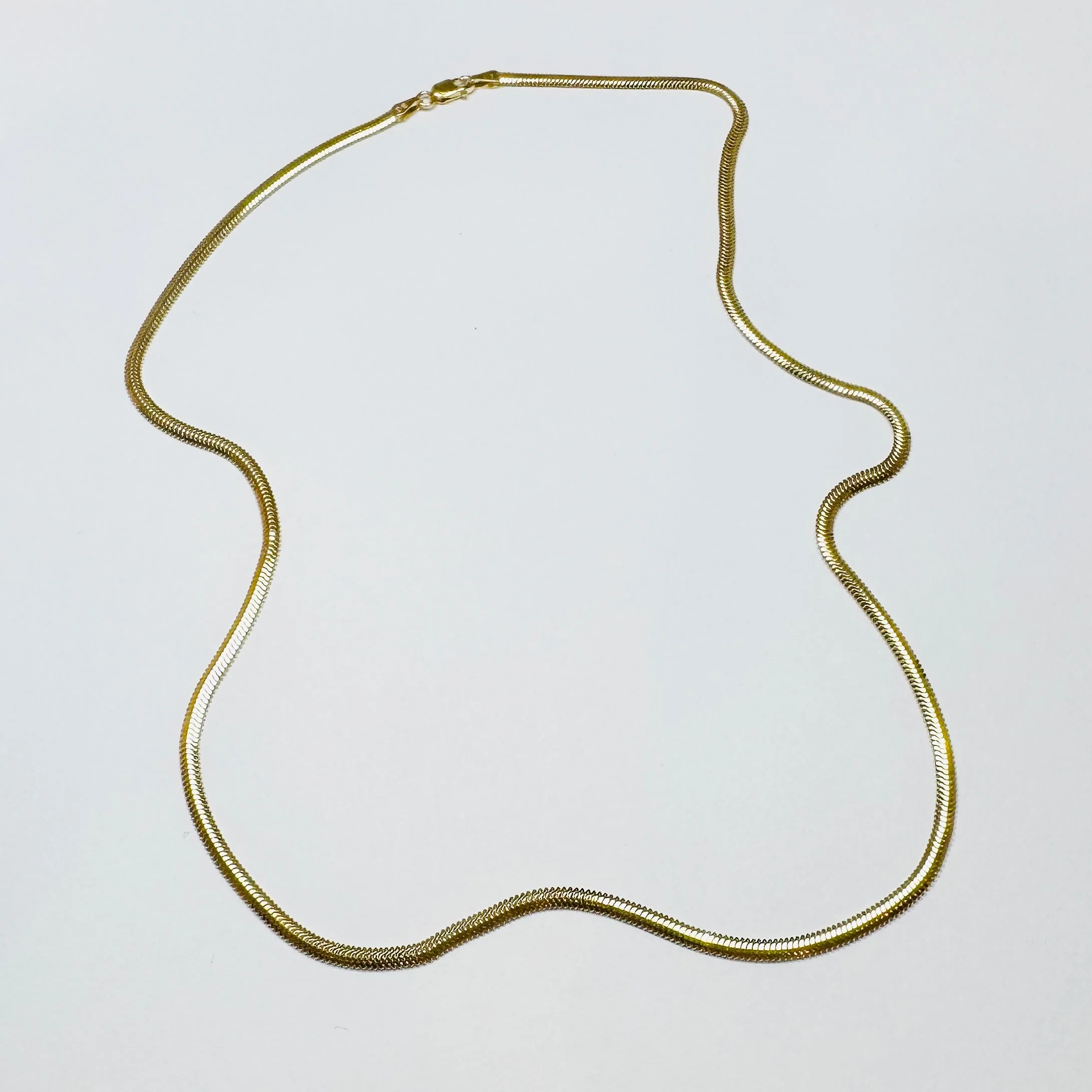 14 k gold herringbone chain sold by Theodosia