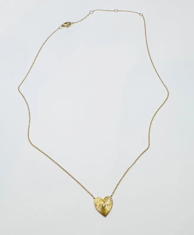fluted heart necklace sold by Theodosia