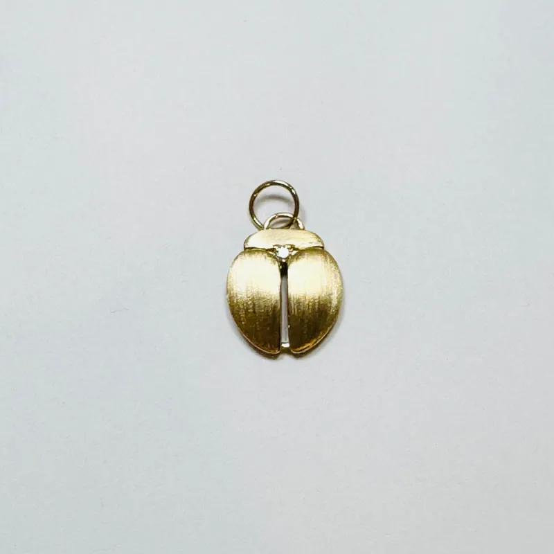 scarab beetle pendant, gold made by Theodosia