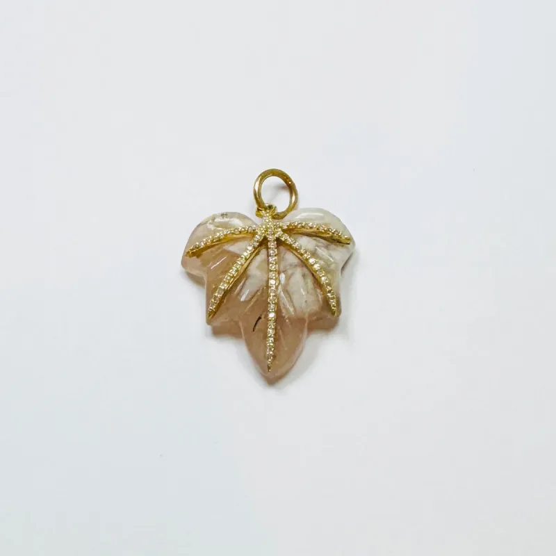 carved leaf pendant sold by Theodosia