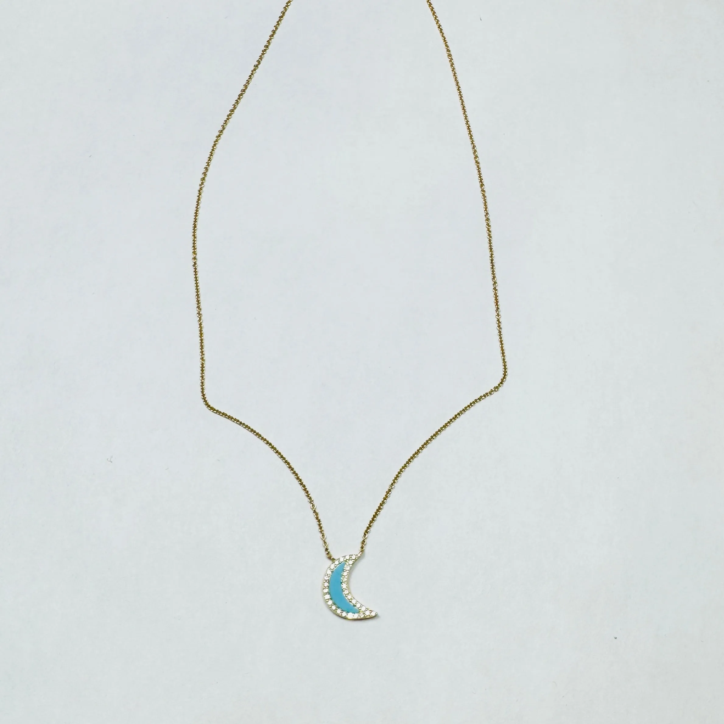 turquoise and diamond moon necklace sold by Theodosia