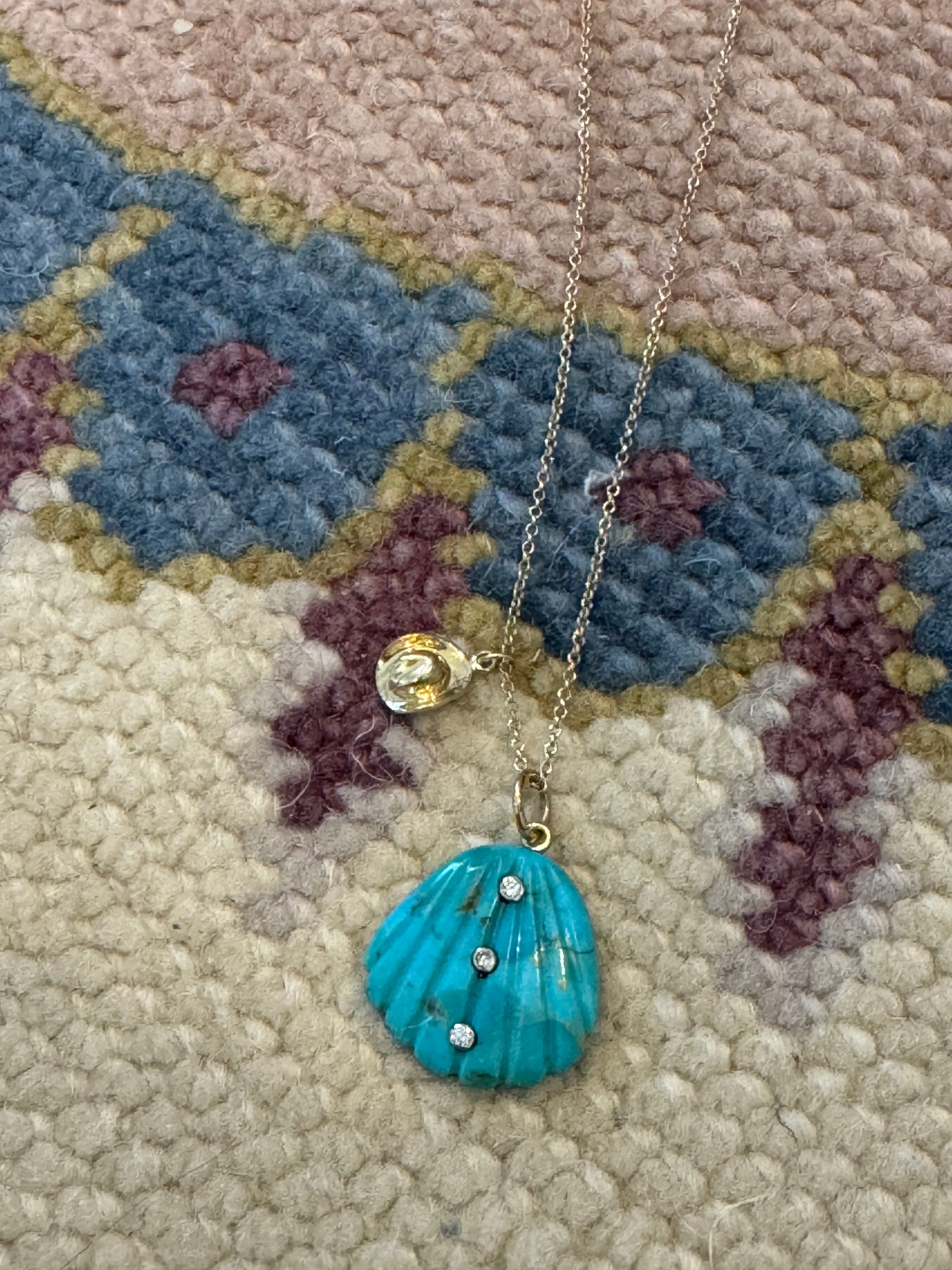 turquoise shell and hat on chain sold by Theodosia