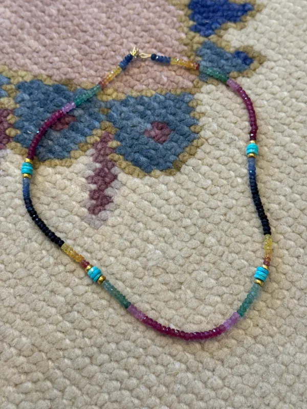 sapphire necklace with turquoise and gold beads sold by Theodosia