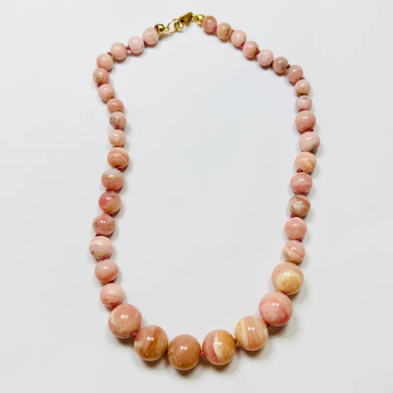 knotted gumball pink opal necklace sold by Theodosia