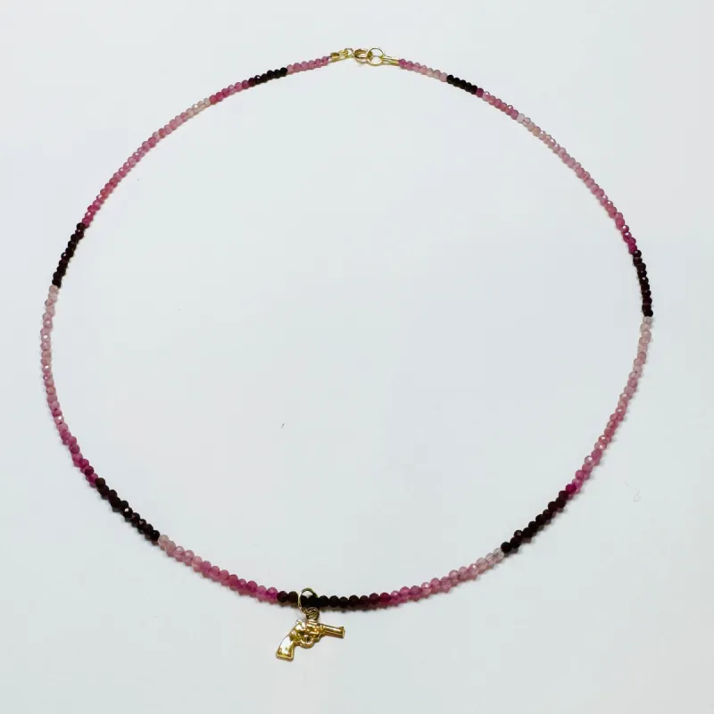 delicate with pistol charm made by Theodosia