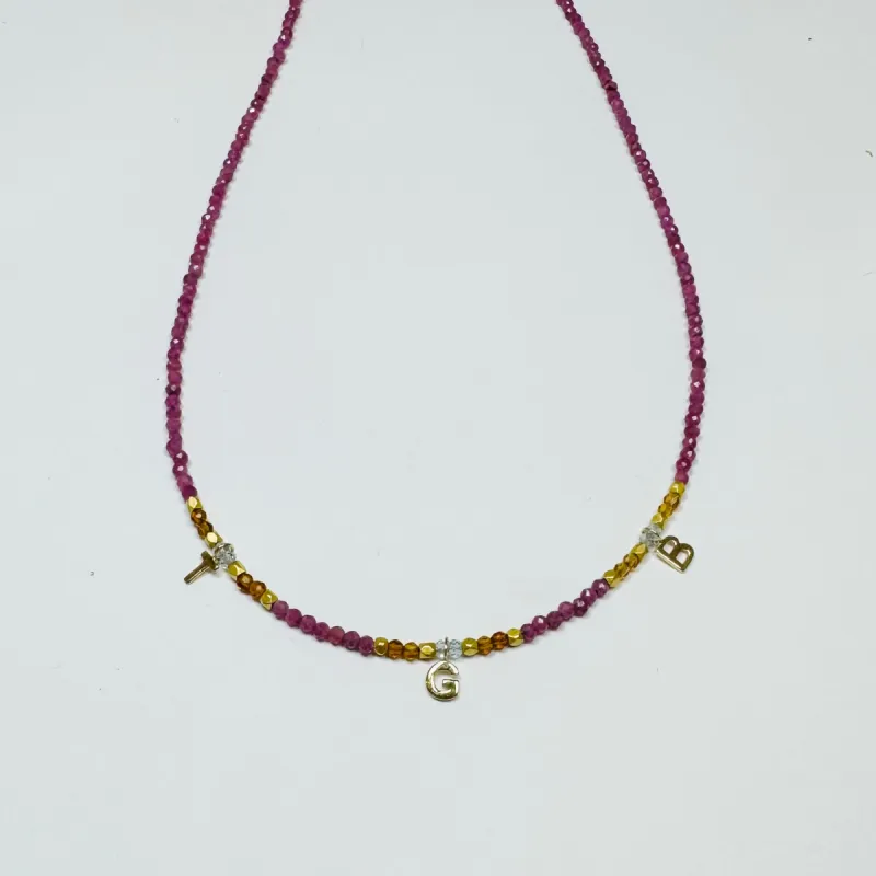 delicate inital necklace sold by Theodosia
