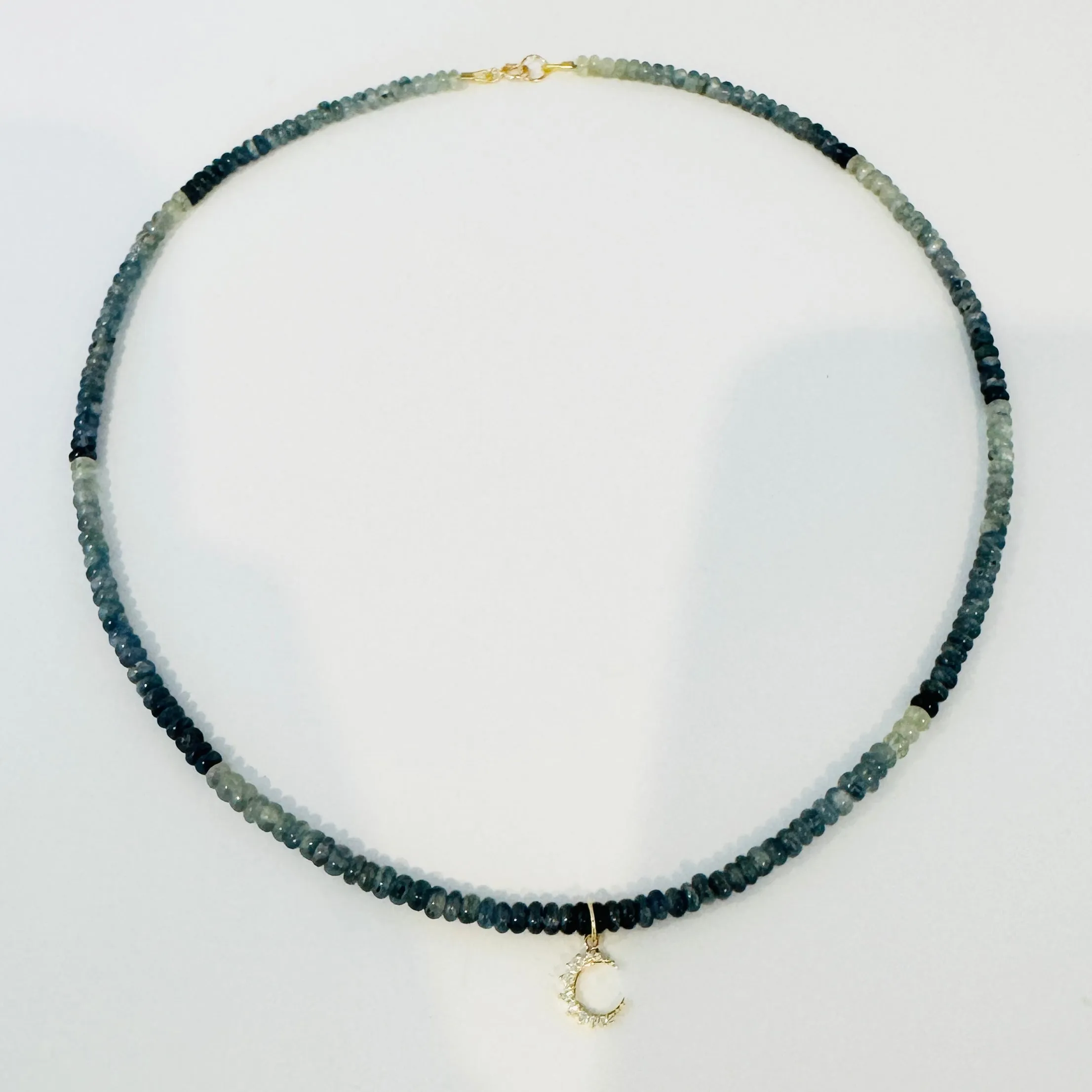 blue sapphire necklace with moon charm sold by Theodosia