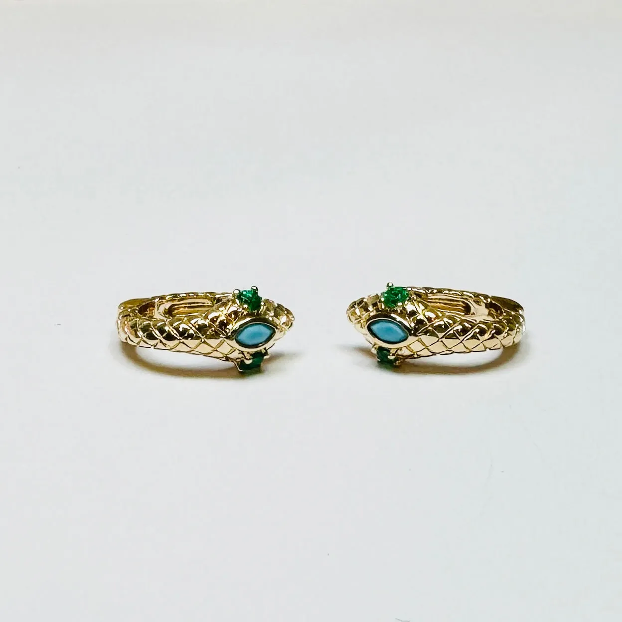 turquoise and emerald snake huggies sold by Theodosia