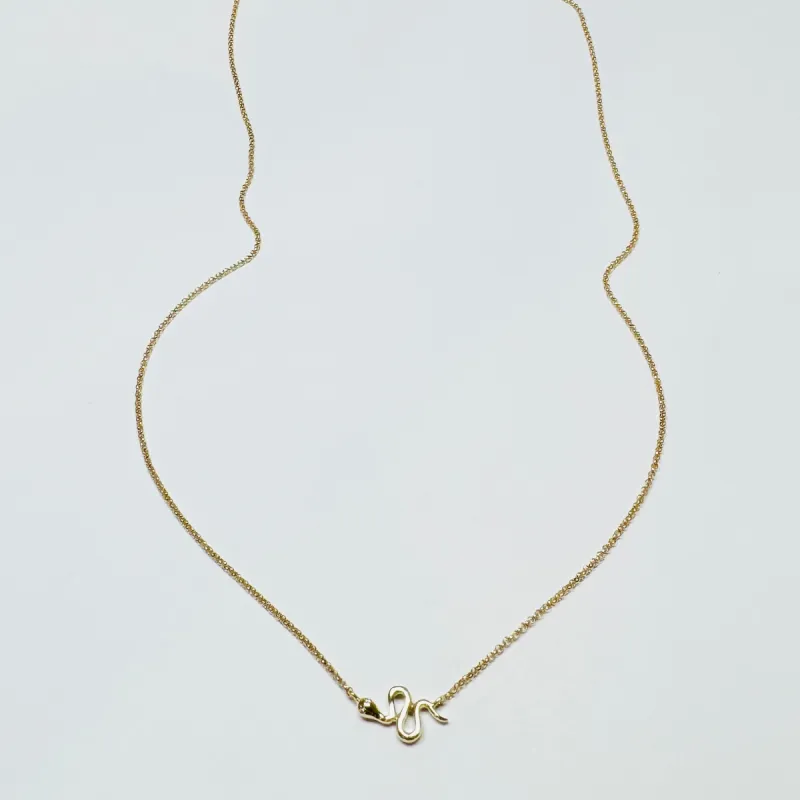 gold snake necklace sold by Theodosia