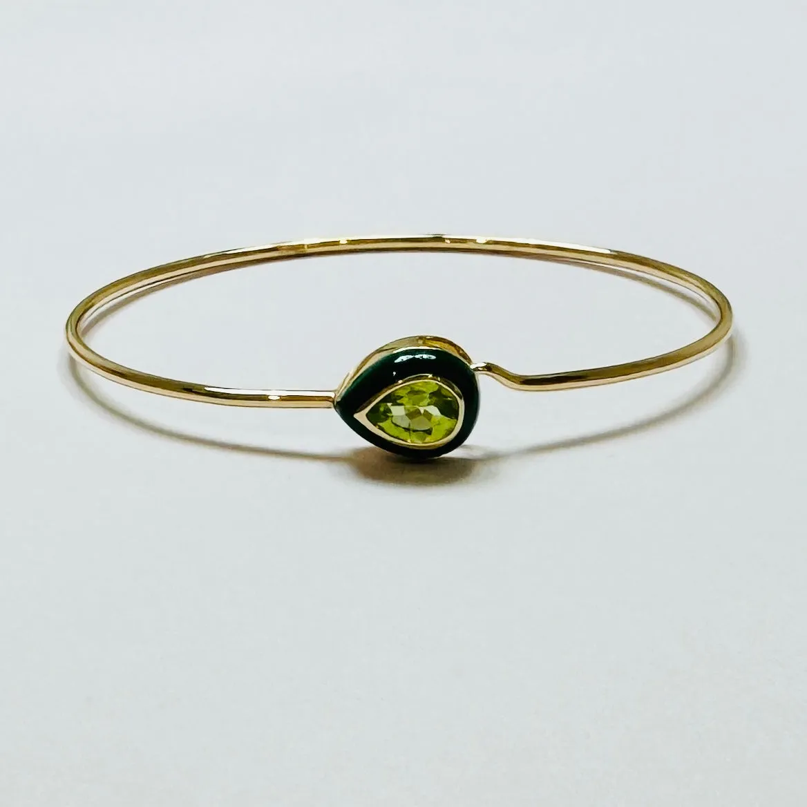 peridot pear bangle sold by Theodosia