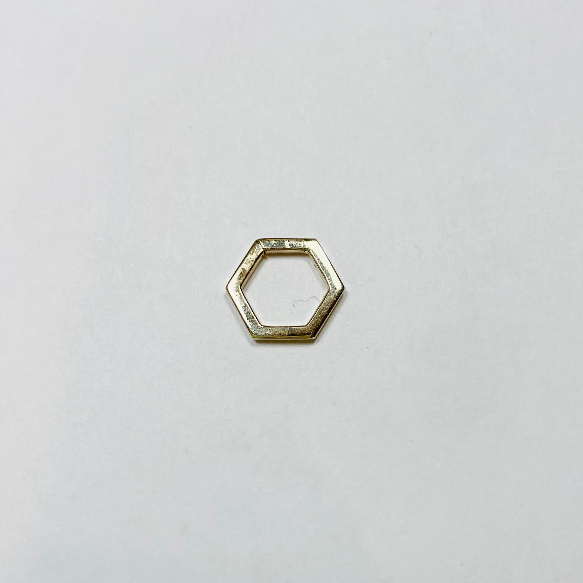 small hexagon gold connector sold by Theodosia